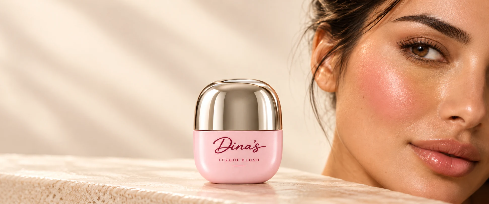 Dina’s Liquid Blush campaign with signature pink packaging and a beauty portrait